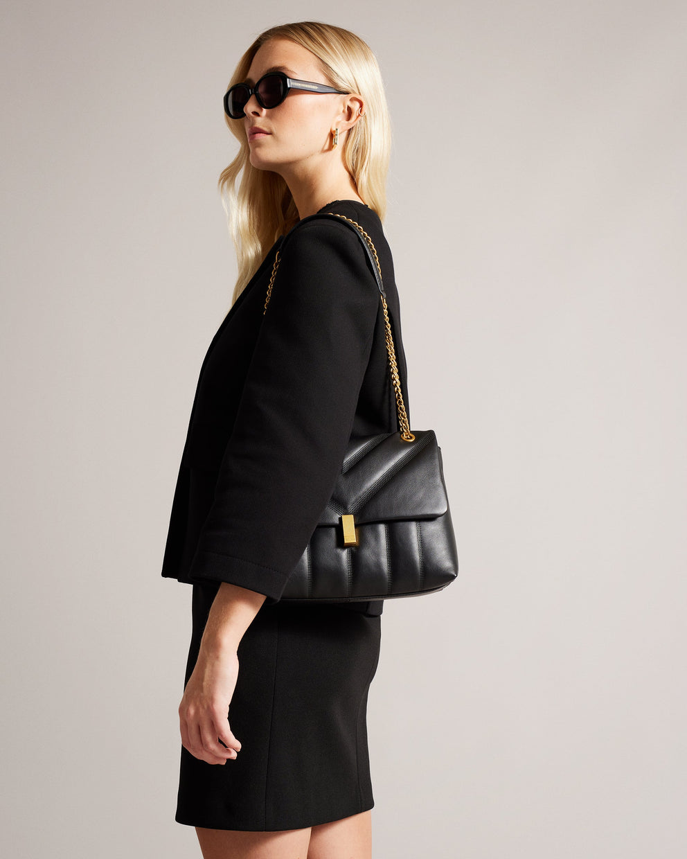 T.E.D B.A.K.E.R Ayasie Quilted Large Twist Lock Xbody Black