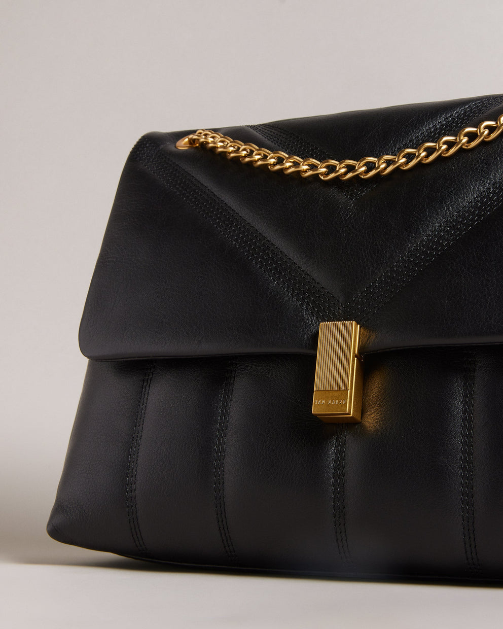 T.E.D B.A.K.E.R Ayasie Quilted Large Twist Lock Xbody Black