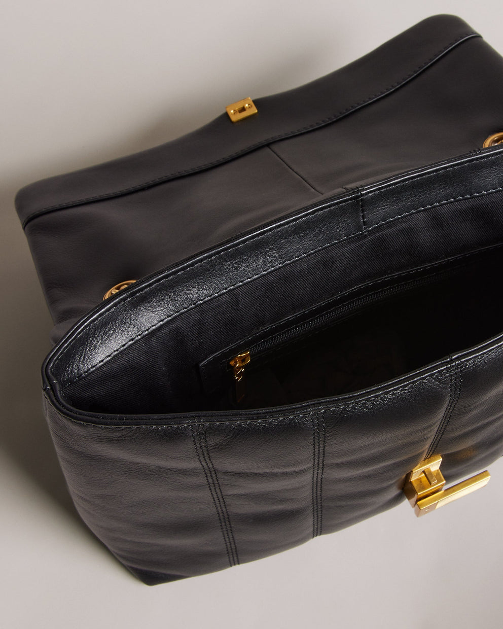 T.E.D B.A.K.E.R Ayasie Quilted Large Twist Lock Xbody Black