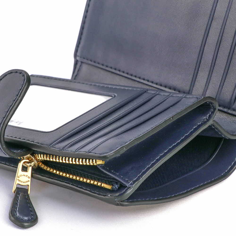 COACH Medium Bifold Corner Zip Wallet In Signature Canvas