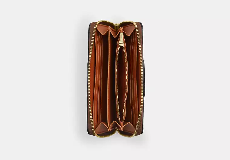 C.O.A.C.H Long Zip Around Wallet In Signature Canvas With Stripe