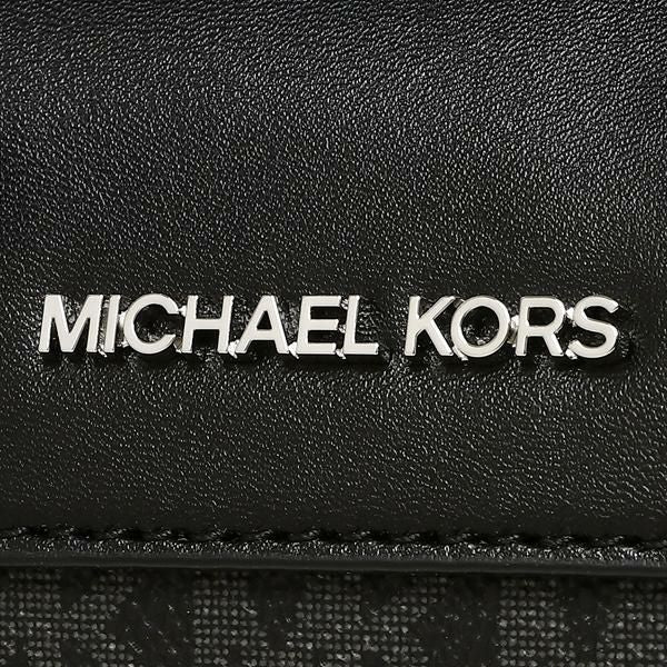 M.I.C.H.A.E.L K.O.R.S Travel Extra Small Duffle Crossbody Bag in Signature Black