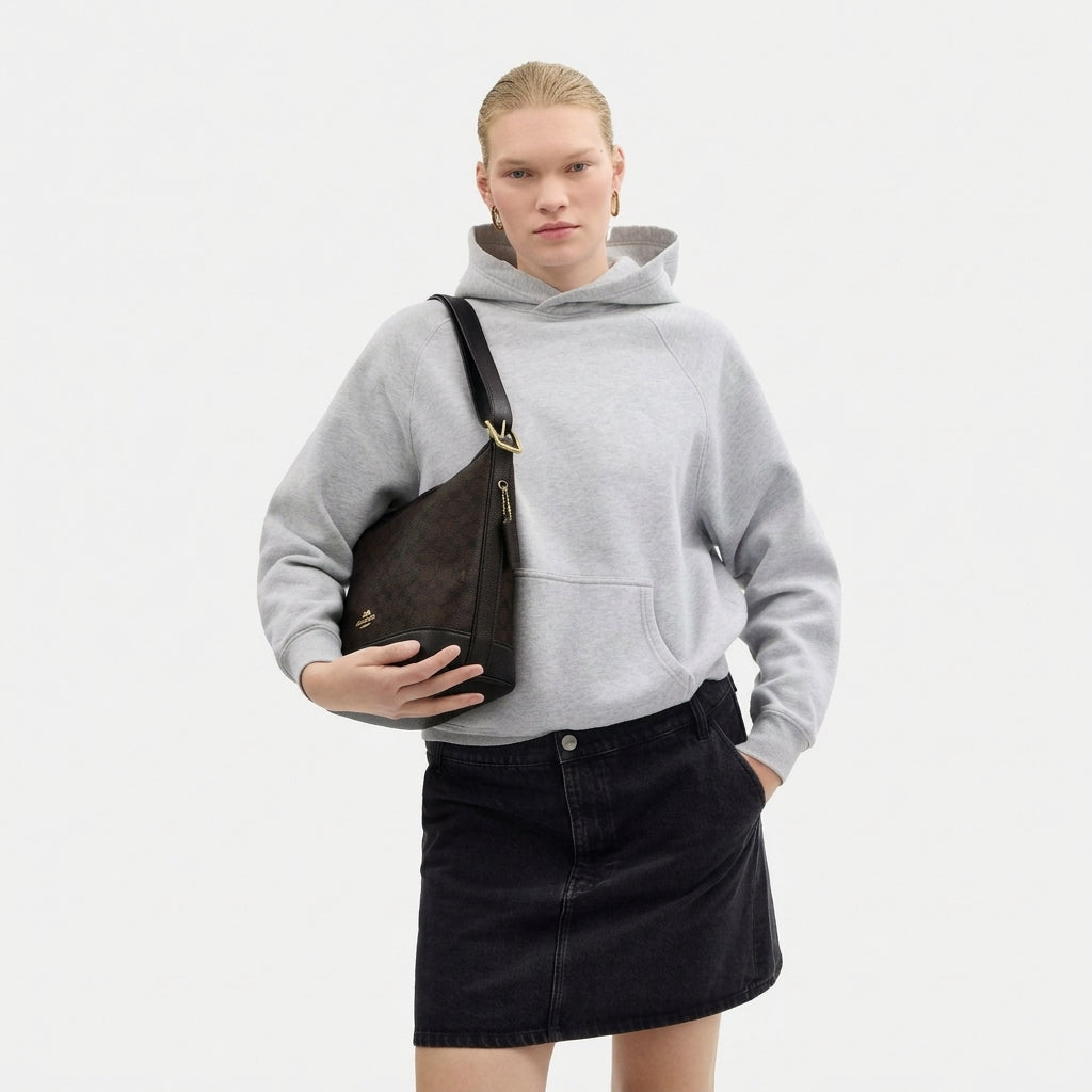 C.O.A.C.H Jude Signature Canvas Duffle Bag