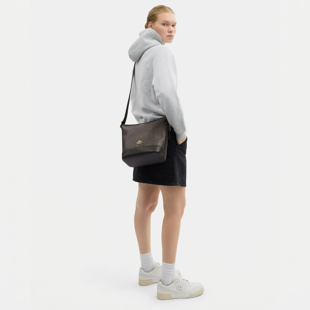 C.O.A.C.H Jude Signature Canvas Duffle Bag