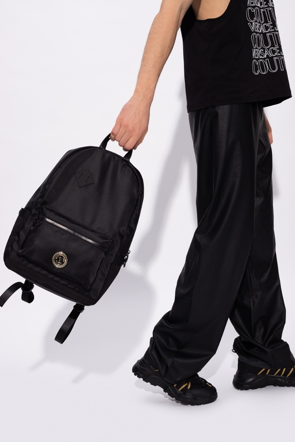 V.E.R.S.A.C.E. J.E.A.N.S. C.O.U.T.U.R.E. BACKPACK