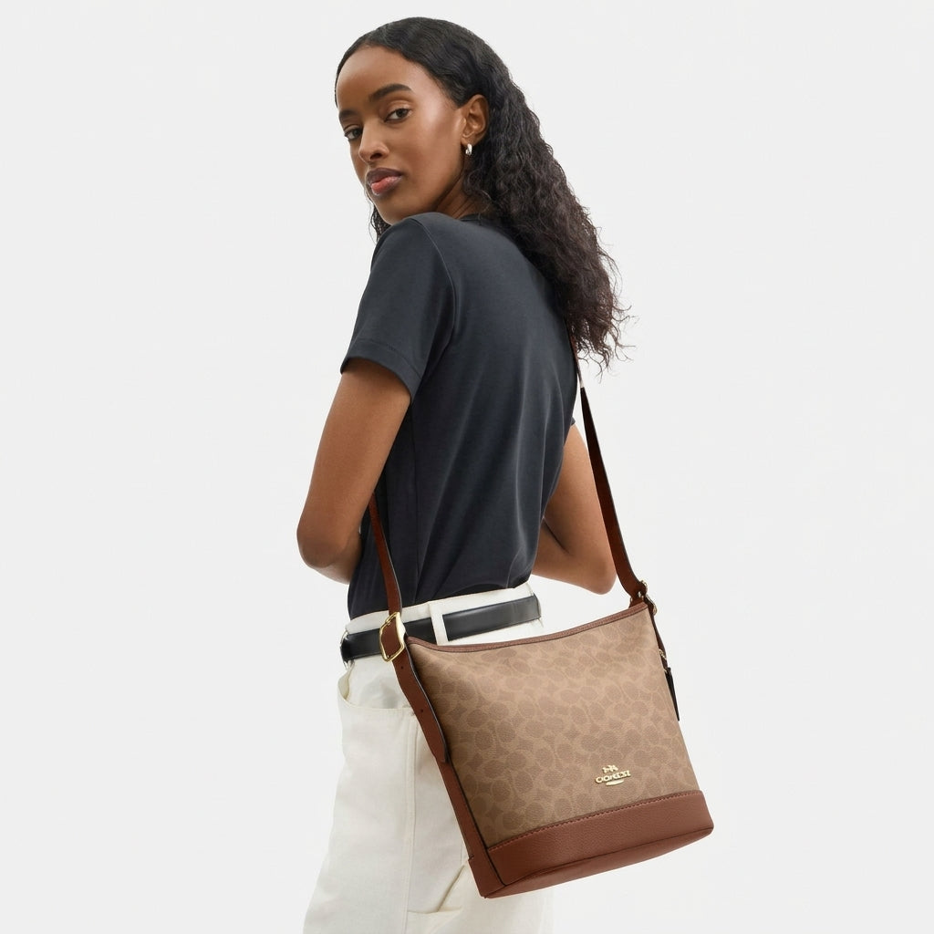 C.O.A.C.H Jude Signature Canvas Duffle Bag
