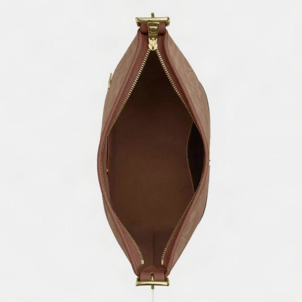 C.O.A.C.H Jude Signature Canvas Duffle Bag