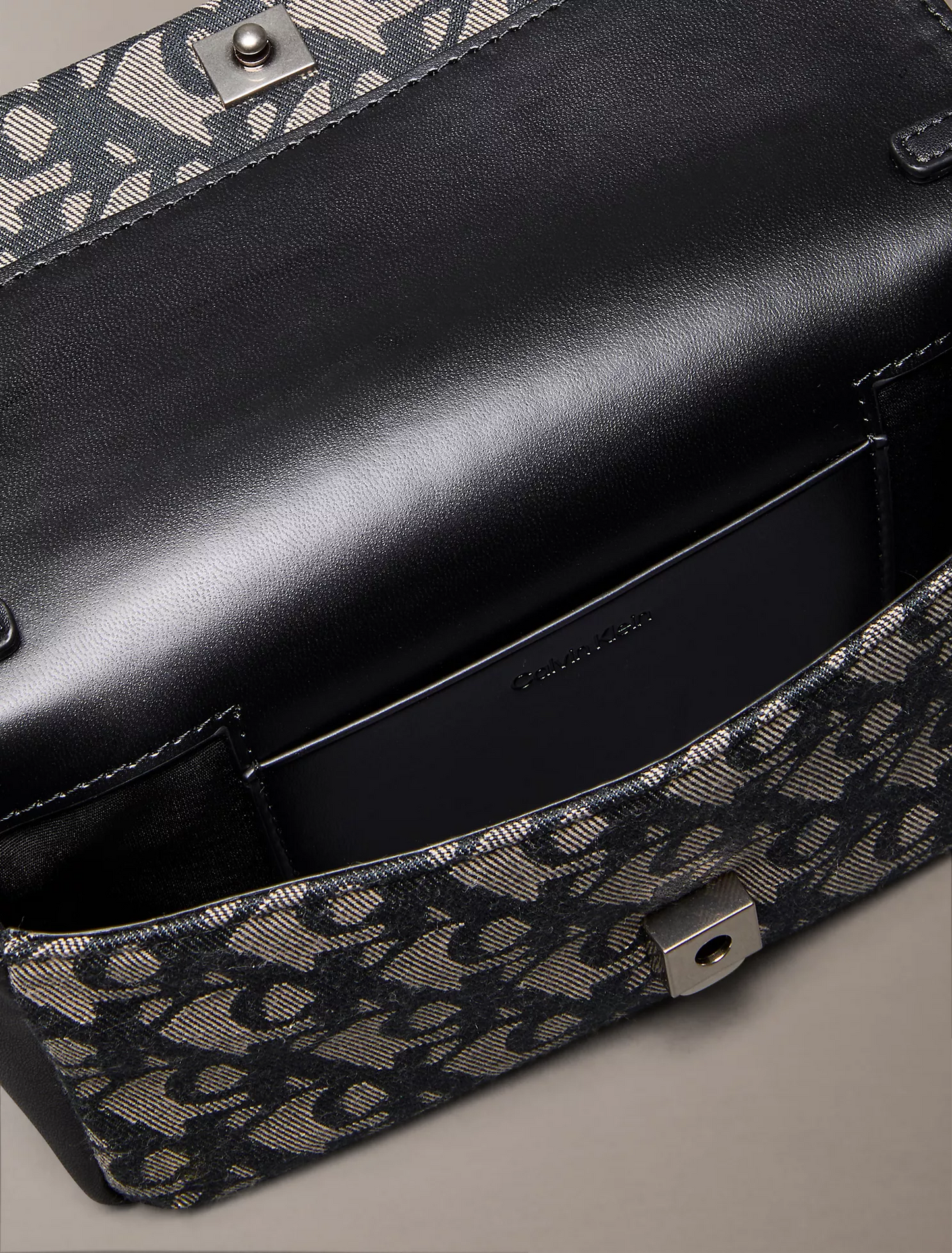 C.A.L.V.I.N K.L.E.I.N  Allover Monogram Flap Crossbody Bag