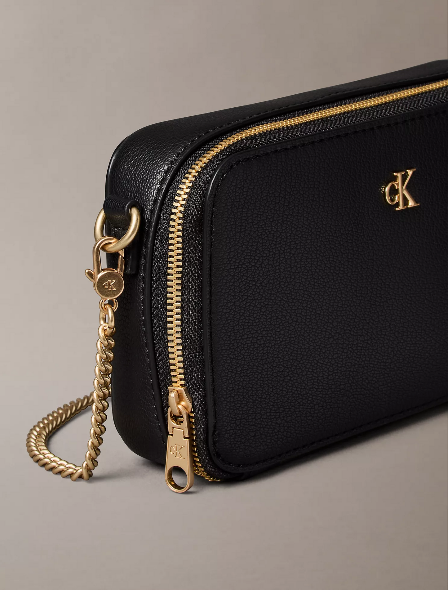 C.A.L.V.I.N K.L.E.I.N Minimal Monogram Camera Bag
