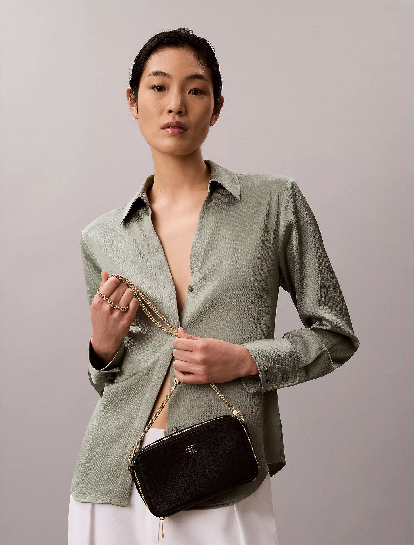 C.A.L.V.I.N K.L.E.I.N Minimal Monogram Camera Bag