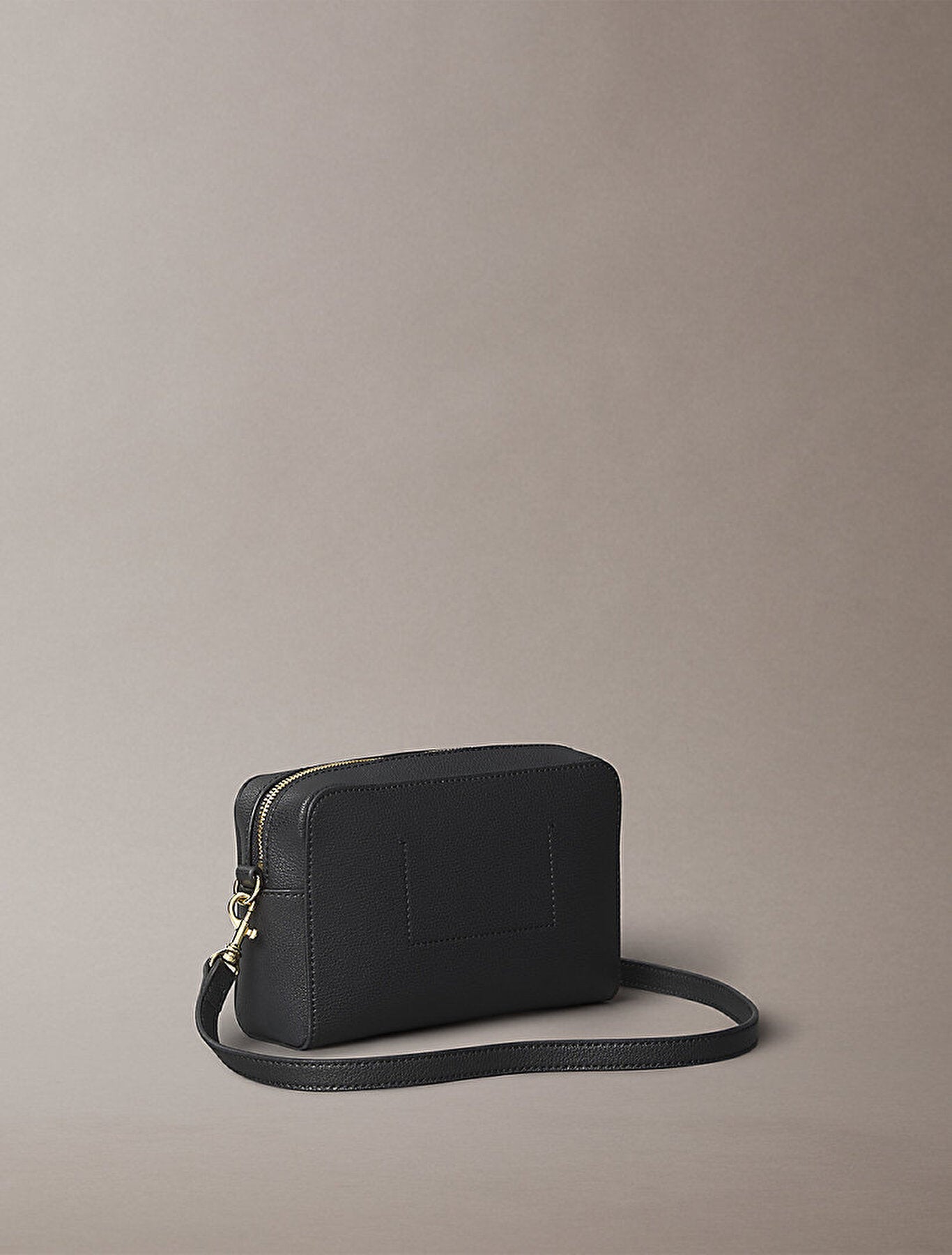 C.A.L.V.I.N  K.L.E.I.N Minimal Monogram Crossbody Bag