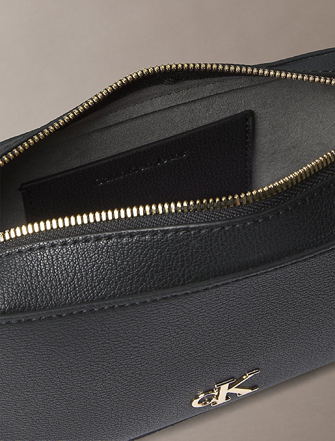 C.A.L.V.I.N  K.L.E.I.N Minimal Monogram Crossbody Bag