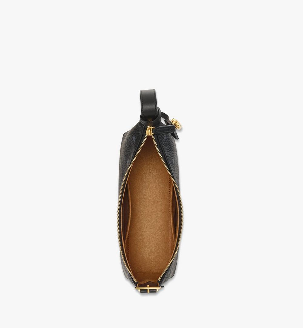 M.C.M CROSS BODY BAG