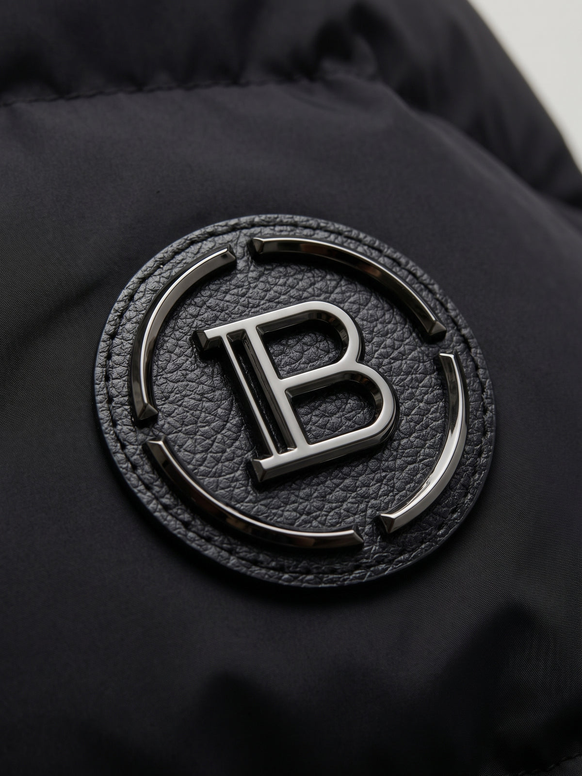 B.A.L.M.A.I.N Black Logo Knit Sleeve Jacket.