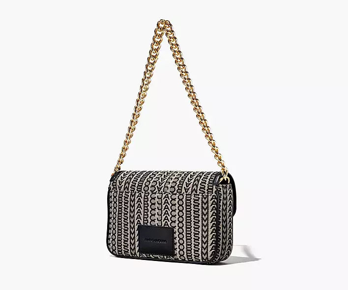 M.A.R.C. J.A.C.B.O.S CROSS MAGNET HANDBAG