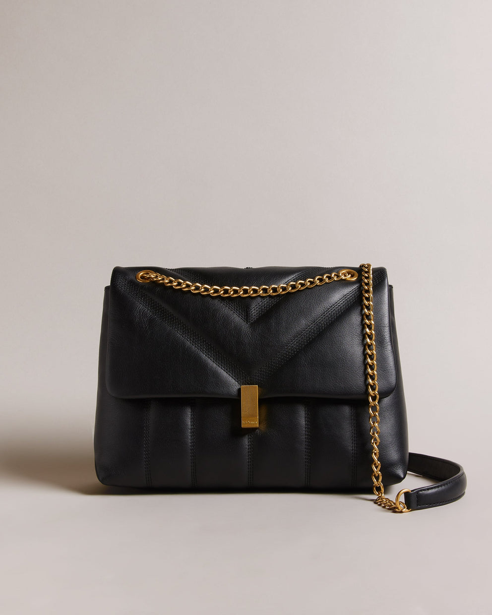 T.E.D B.A.K.E.R Ayasie Quilted Large Twist Lock Xbody Black