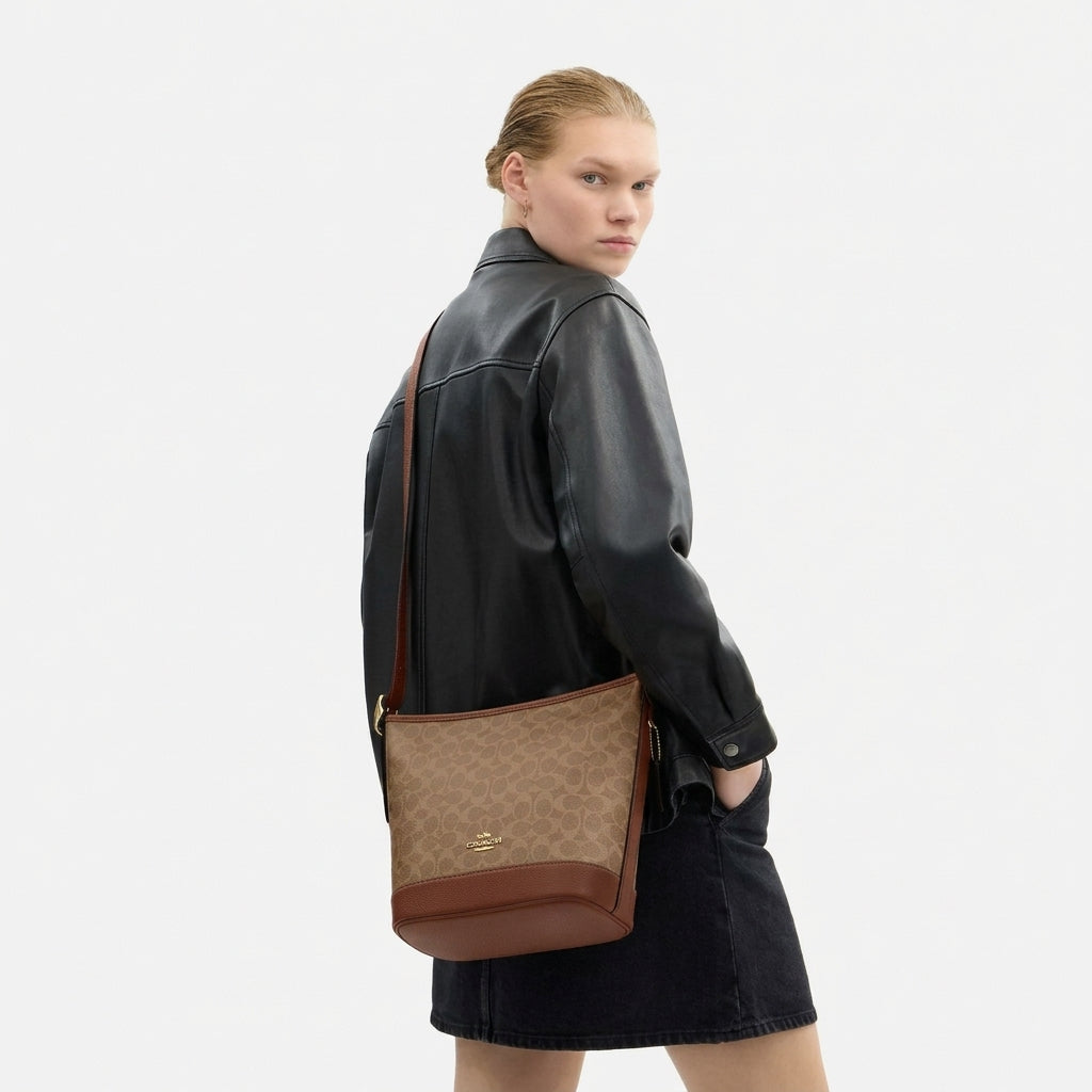 C.O.A.C.H Jude Signature Canvas Duffle Bag