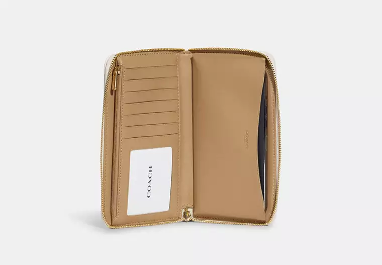 C.O.A.C.H Dempsey Large Phone Wallet In Signature Jacquard With Stripe And Coach Patch