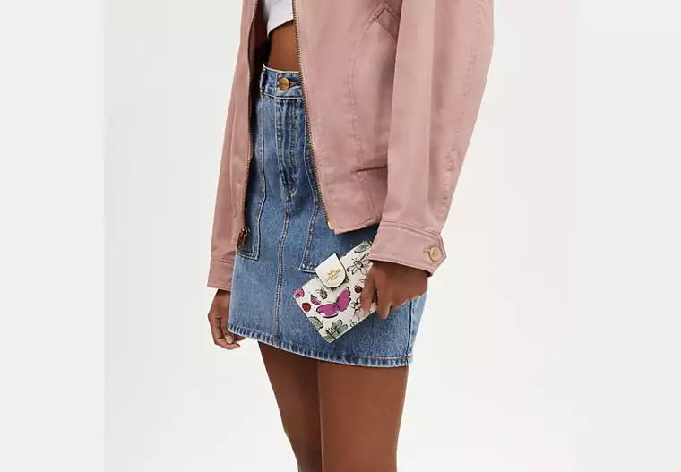 C.O.A.C.H Medium Corner Zip Wallet With Creature Print