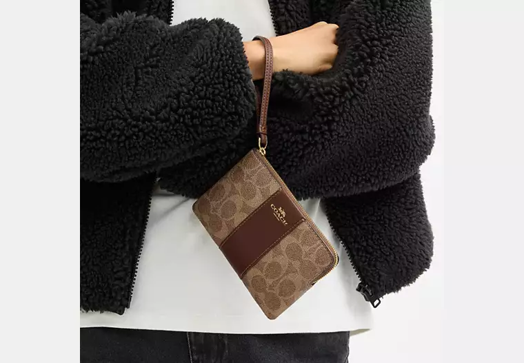 C.O.A.C.H Corner Zip Wristlet In Signature Canvas With Stripe