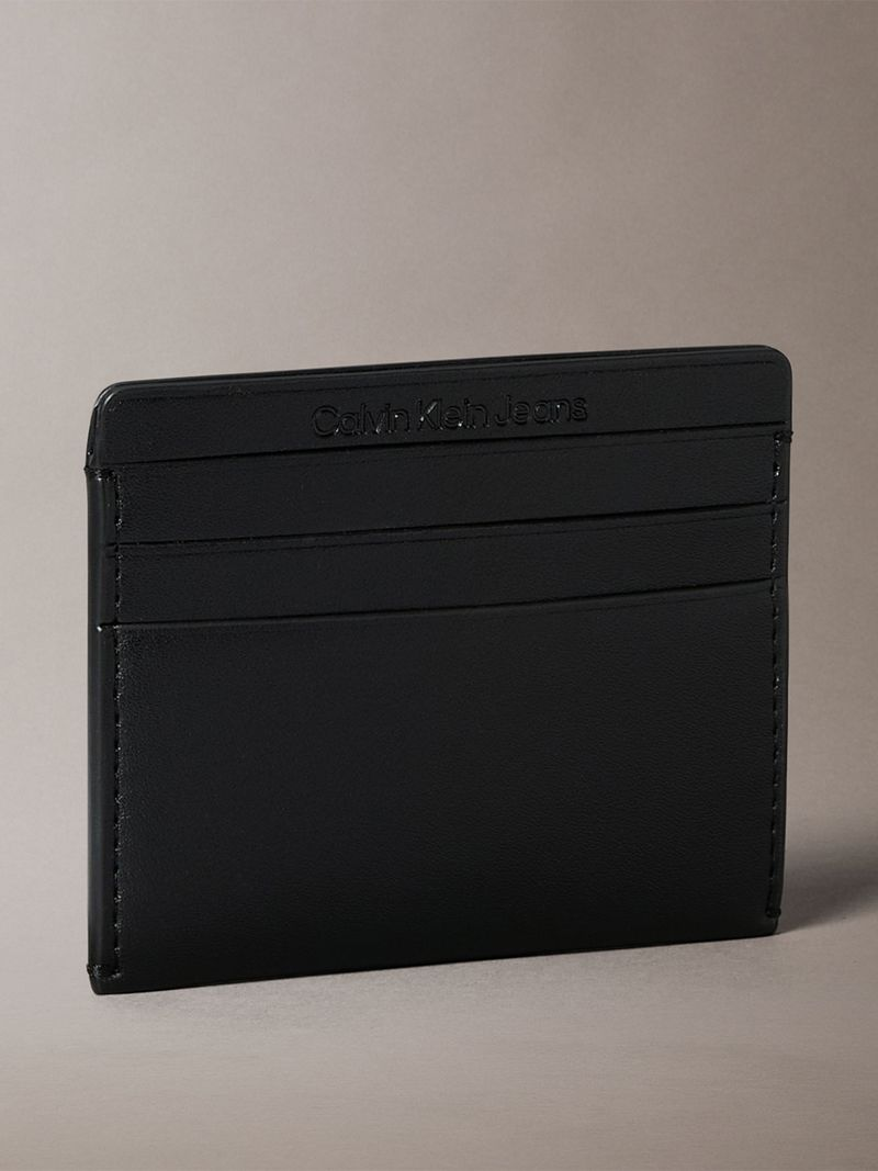 C.A.L.V.I.N K.L.E.I.N  Sculpted card holder with embossed monogram