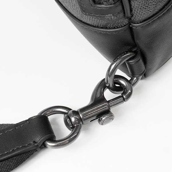 C.O.A.C.H Dominic Sling Pack In Signature Canvas