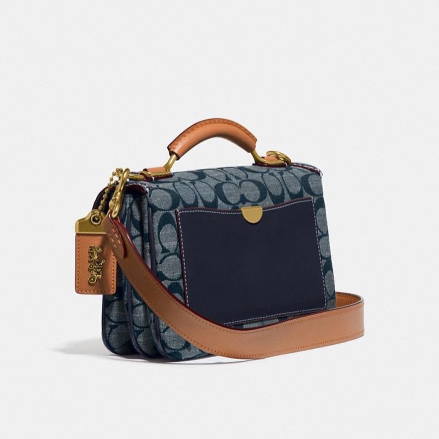 COACH Riley Women's Top Handle Bag with Sling and Strap for Crossbody Wear