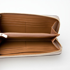 C.O.A.C.H Signature Accordion Zip Wallet With Daisy Flowers