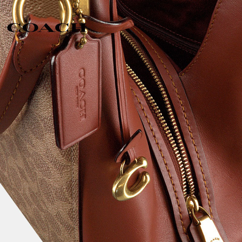 C.O.A.C.H Dalton 31 With Signature Canvas Blocking for Shoulder Wear